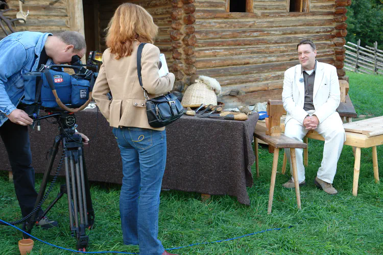 Wolfgang Neubauer is interviewed at the European Researchers Night in September 2007 at the open-air museum in Schwarzenbach. At the 'CelticNight' organised by Neubauer, scientists from the University of Vienna presented their research work on site. Besides the dissemination of knowledge to the public, the Celtic Festival also offered a varied cultural programme. Credit: Matthias Kucera/LBI ArchPro.