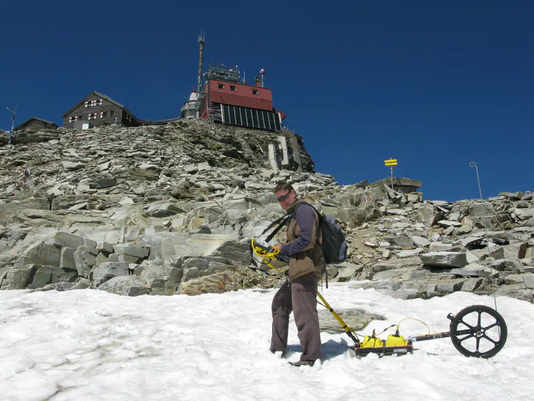 Wolfgang Neubauer at the ZAMG Sonnblick observatory (3106m). The project in cooperation with the University of Vienna (VIAS) and the ZAMG aims to monitor the change of the permafrost. Therefore the area surrounding the station was scanned using TLS, far range TLS and ALS. Additionally, GPR was applied at Sonnblick in 2010. Credit: Matthias Kucera/LBI ArchPro.